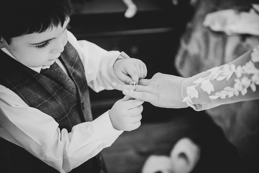 The brides son, Leo, putting on her engagement ring on the morning of the wedding