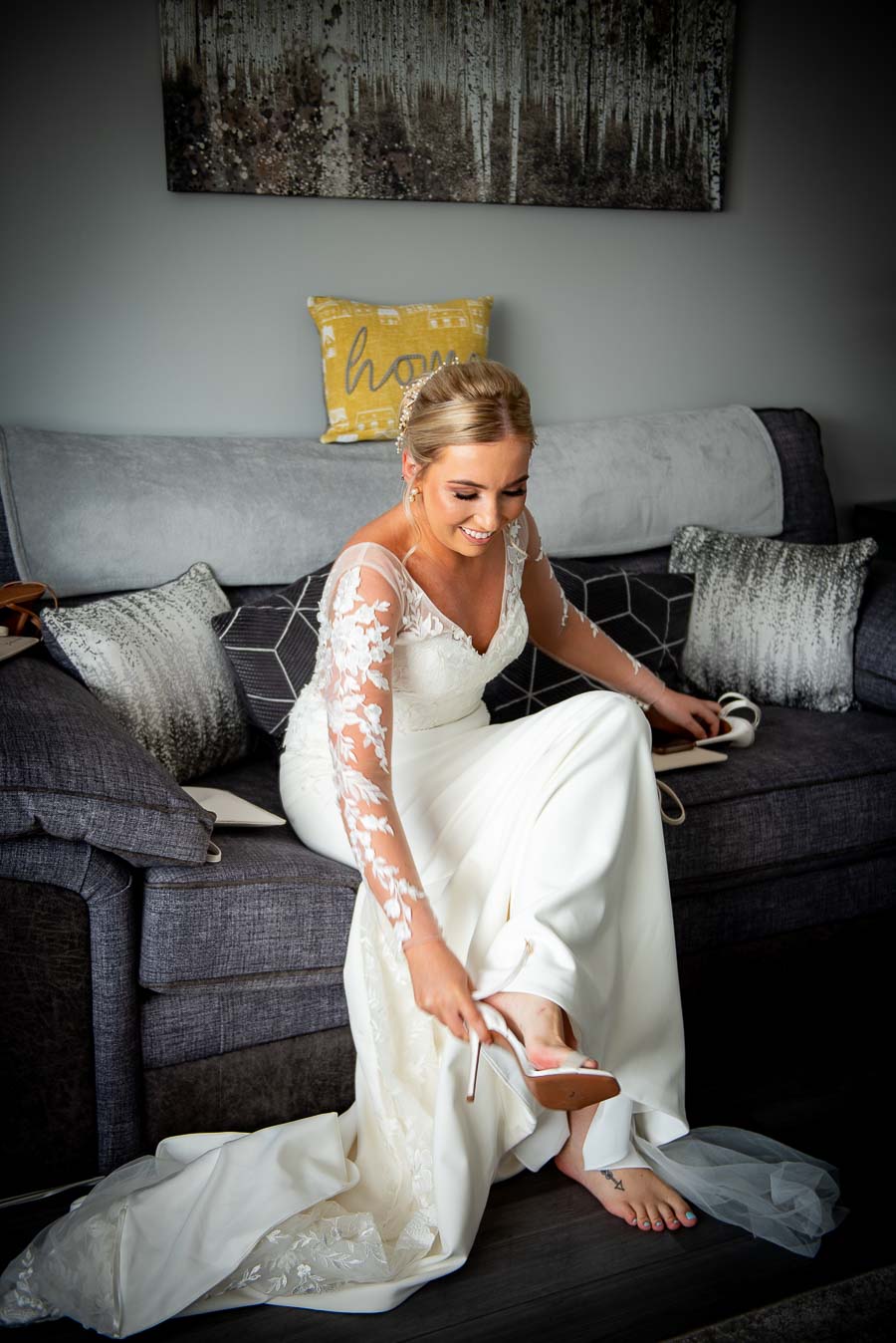 Bride putting on her shoe