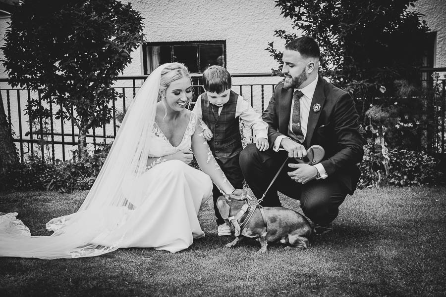 The family share a lovely moment as the pet dog arrived as a surprise for them