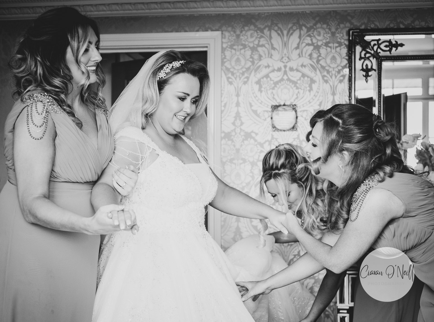 Bridesmaids helping our injured bride to her feet
