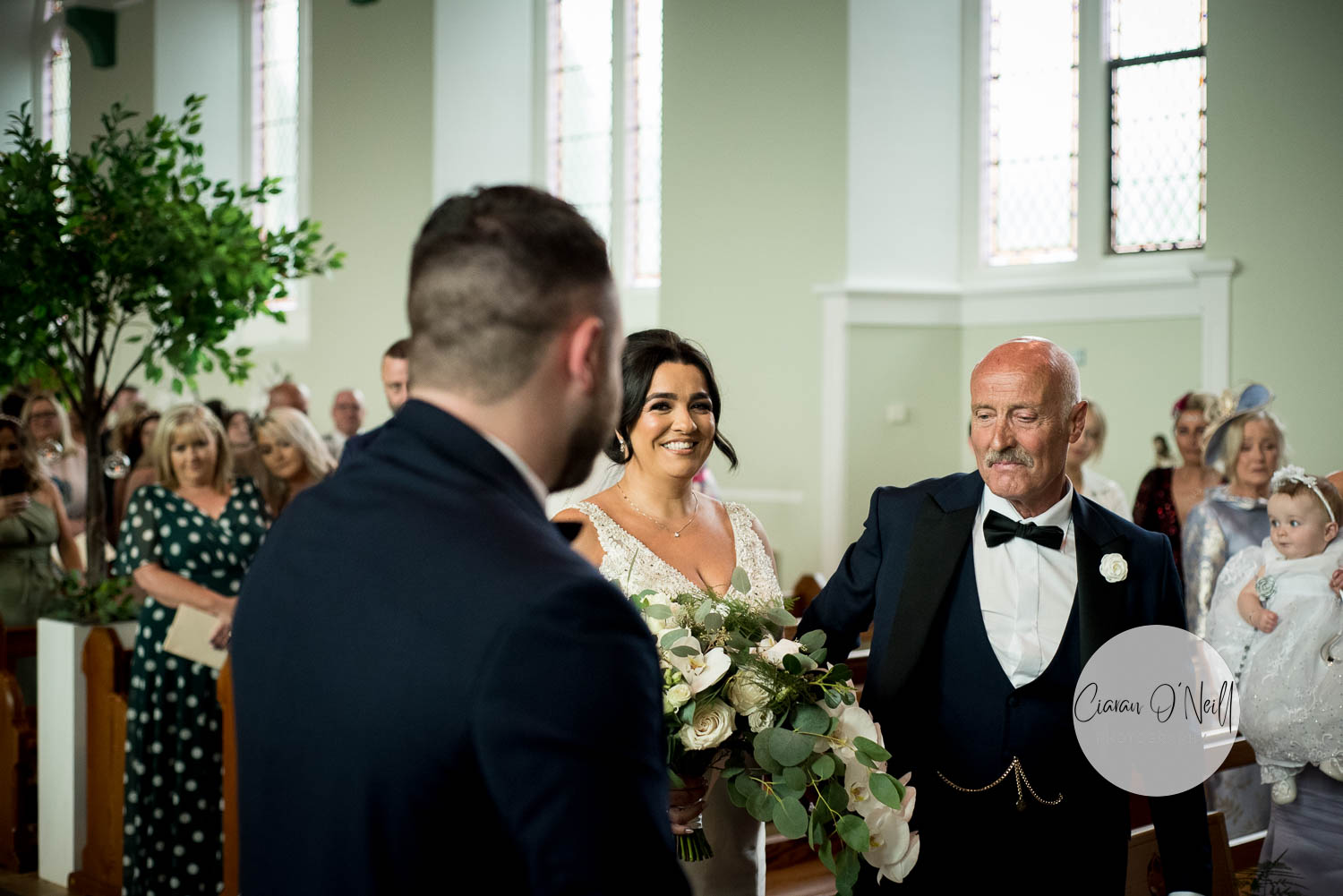 Bride and groom see each other for the first time on their wedding day