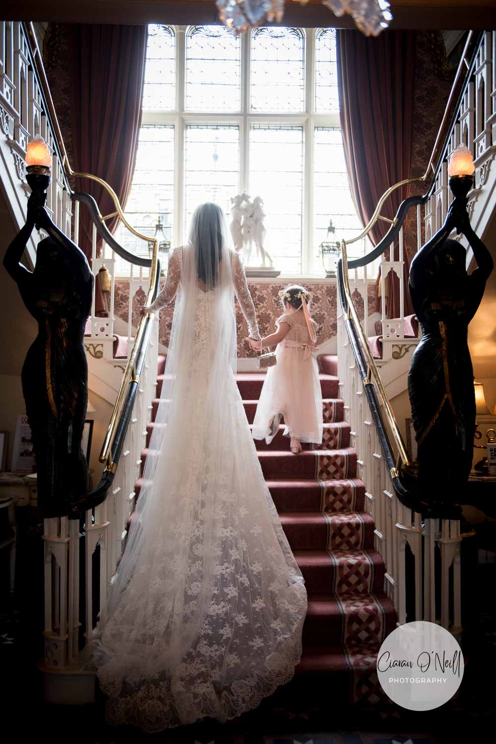 Bride and daughter going to bed Cabra Castle Ciaran O'Neill Photography Northern Ireland Wedding Photographers