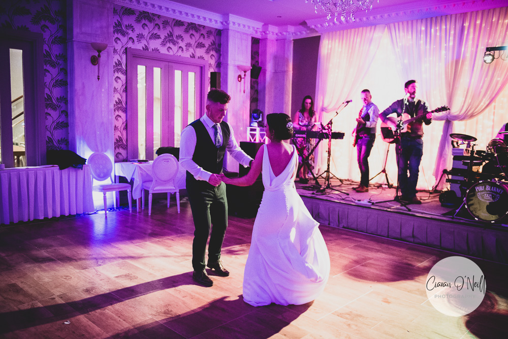 The bride and groom enjoy their first dance