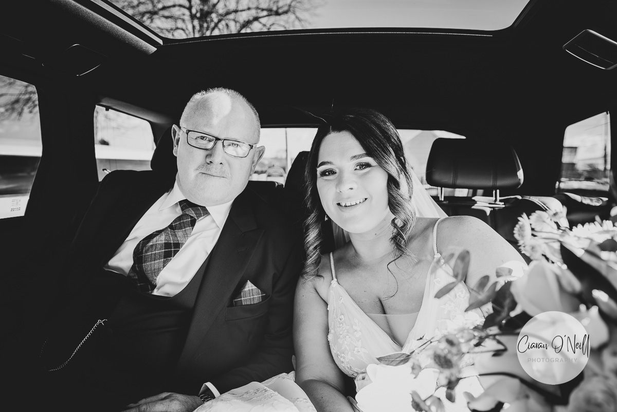 Bride and her father in the car