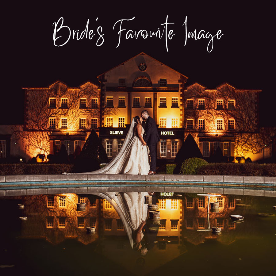 Bride's favourite image is off the couple standing kissing beside the fountain, outside the hotel