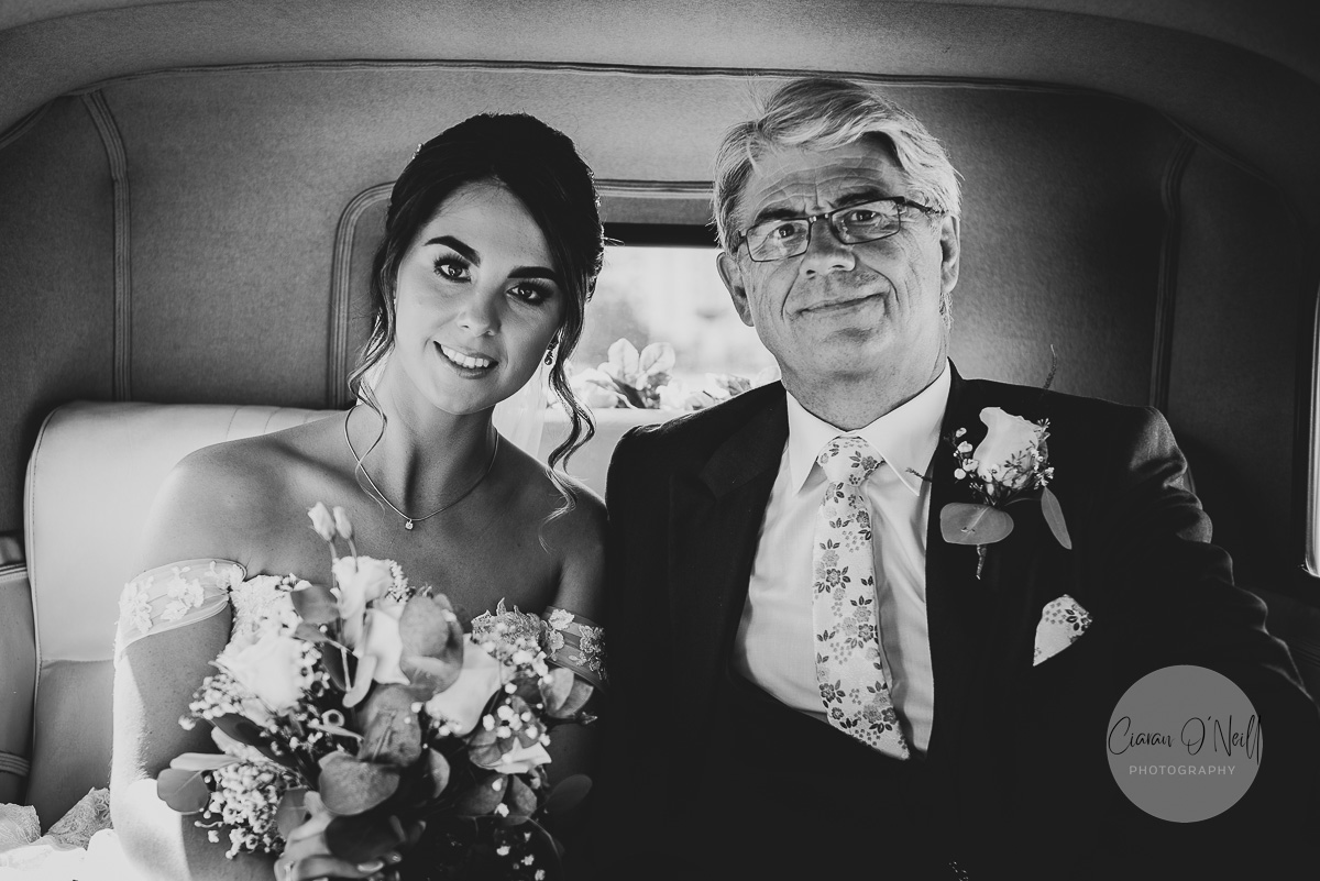 Bride & her father in the bridal car