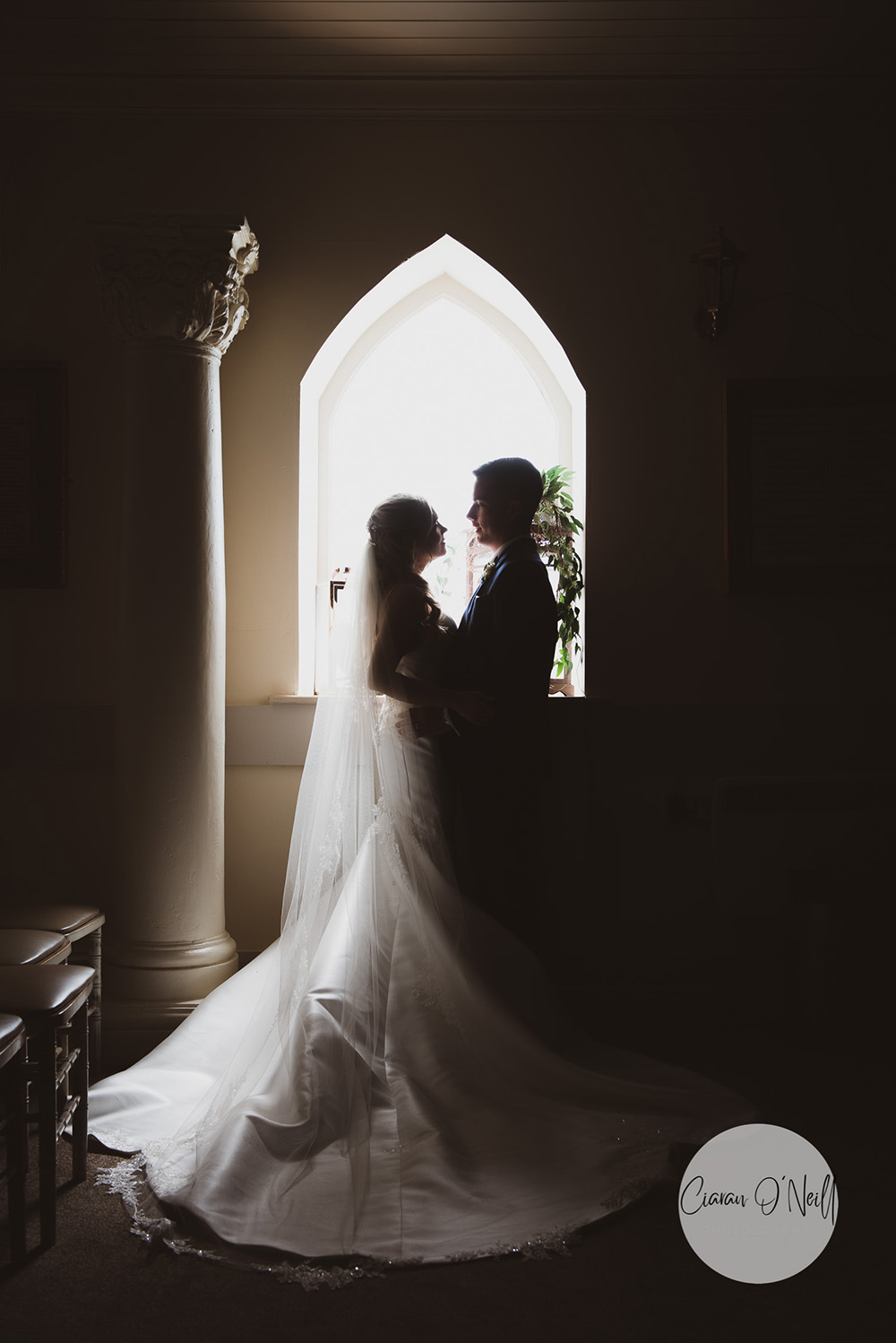 Bride and groom in front of window Darver Castle