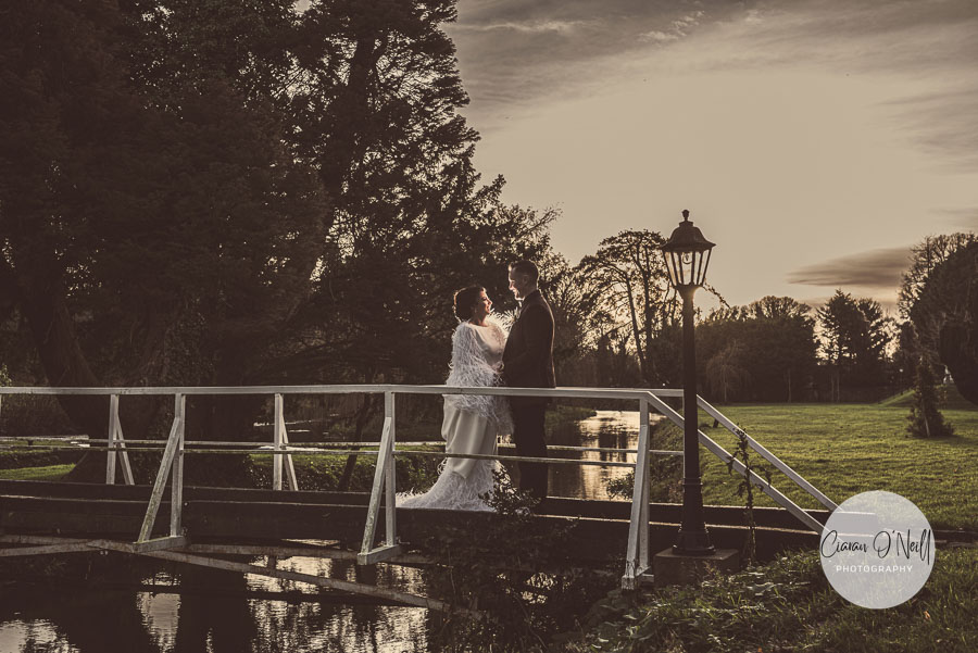 The sun sets on our bride and groom as they share an intimate moment between each other