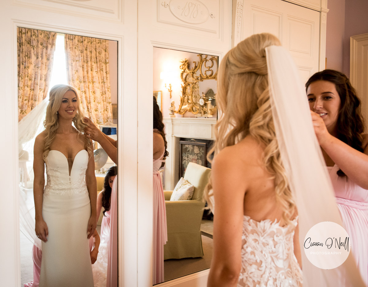 Bride getting ready in one of the rooms at Castle Leslie