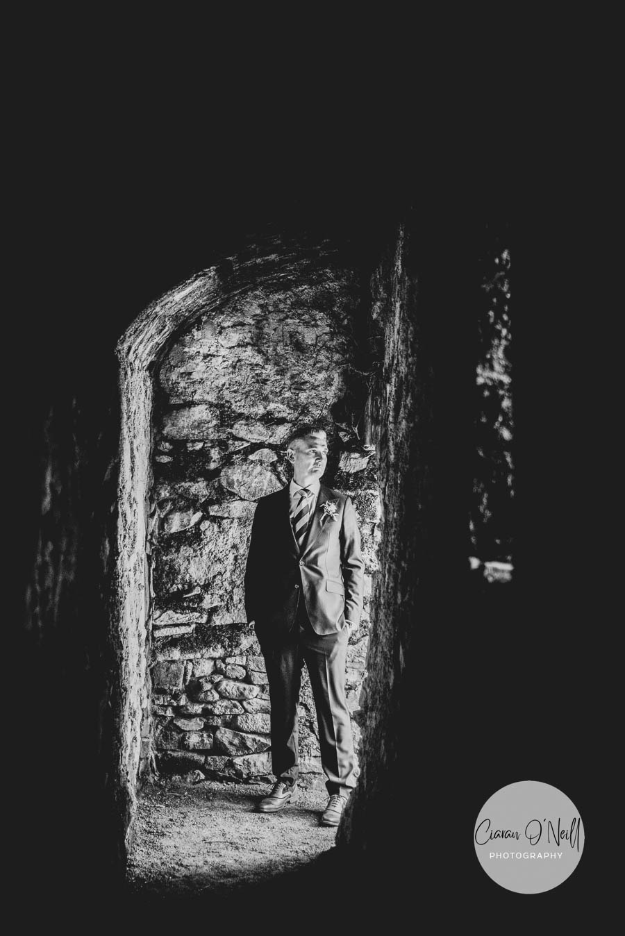 Grooms standing in an archway during a Killeavy Castle wedding