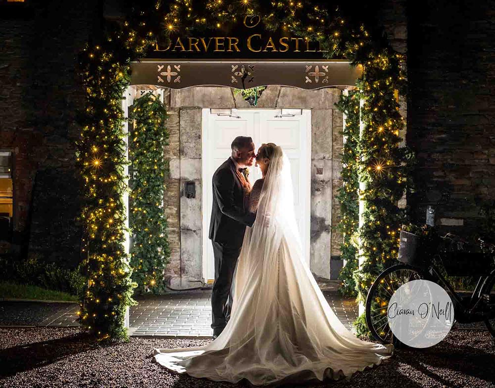 bride and groom kissing at front door Darver Castle wedding Ireland Wedding Photographers Ciaran O'Neill Photography